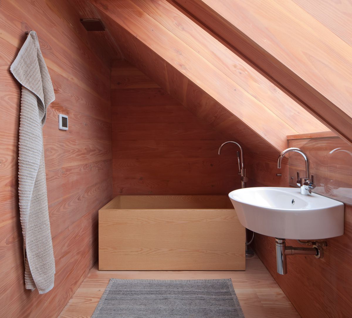 Bathroom with wooden tub