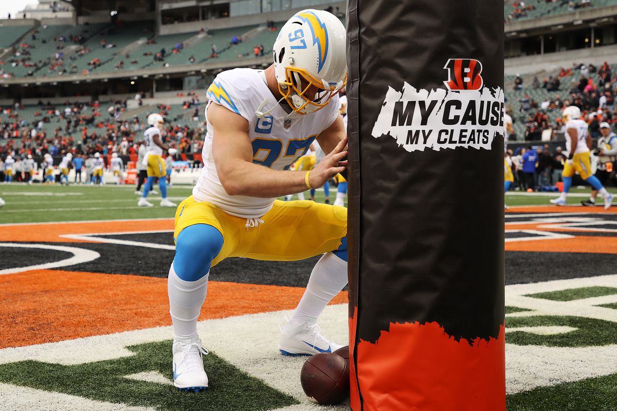Joey Bosa #97 of the Los Angeles Chargers stretches during pregame warm-ups prior to the game against the Cincinnati Bengals at Paul Brown Stadium on December 05, 2021 in Cincinnati, Ohio.