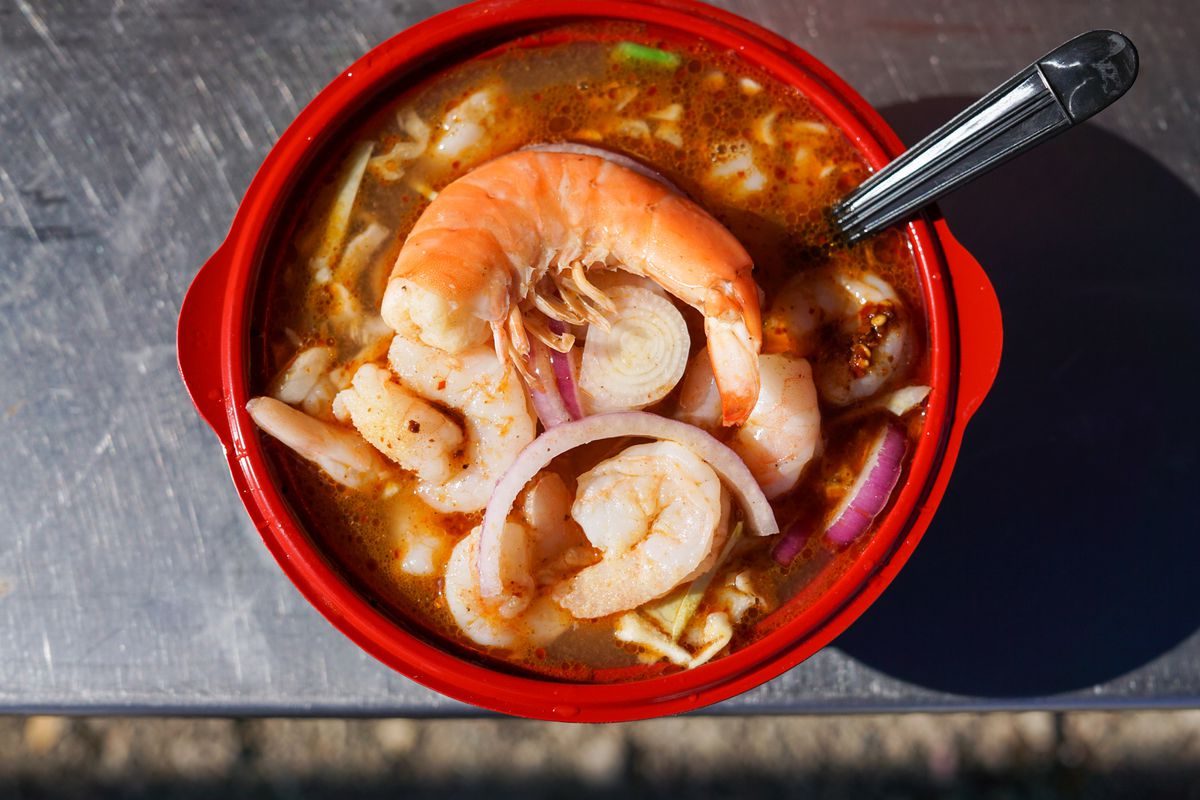 Caguamanta — a stew of stingray filets, tomatoes, vegetables, shrimp, and tuna fin in a seafood stock flavored with spices and dried chiles — is a popular breakfast in Sonora, Mexico. At the Mariscos Odaly truck.