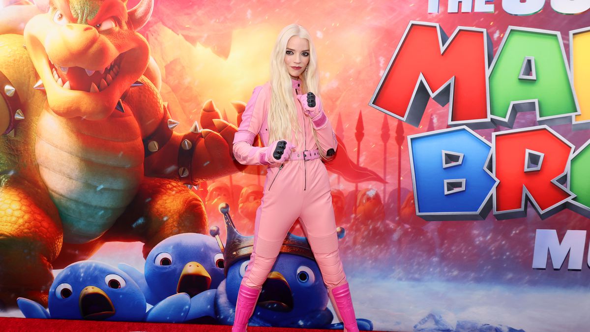 Anya Taylor-Joy&nbsp;poses at the LA premiere of The Super Mario Bros. Movie. She is wearing a pink leather jumpsuit, that looks like Peach’s Mario Kart outfit.