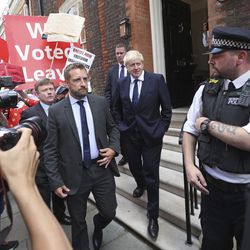 Conservative Party leadership contender Boris Johnson, centre right,  leaves his office in Westminster area of London, Monday July 22, 2019.  Voting closes Monday in the ballot to elect Britain's next prime minister, from the two contenders Jeremy Hunt and Boris Johnson, as critics of likely winner Boris Johnson condemned his vow to take Britain out of the European Union with or without a Brexit deal.(Yui Mok/PA via AP)