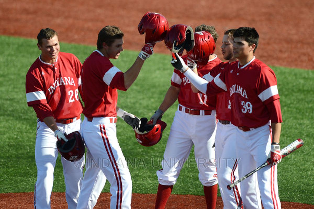 A gaggle of Hoosiers celebrate Brian Wilhite's first career HR on Wednesday.