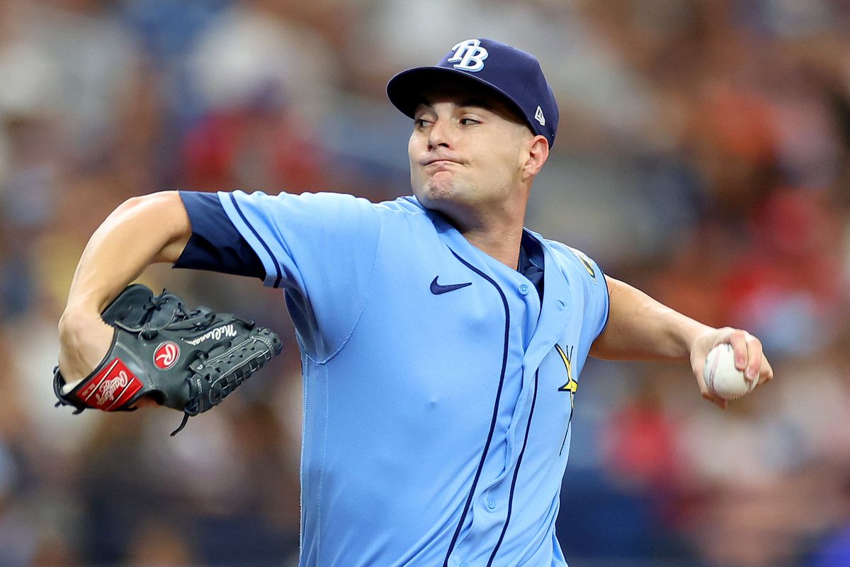 Shane McClanahan #18 of the Tampa Bay Rays pitches during a game against the Texas Rangers at Tropicana Field on June 11, 2023 in St Petersburg, Florida.