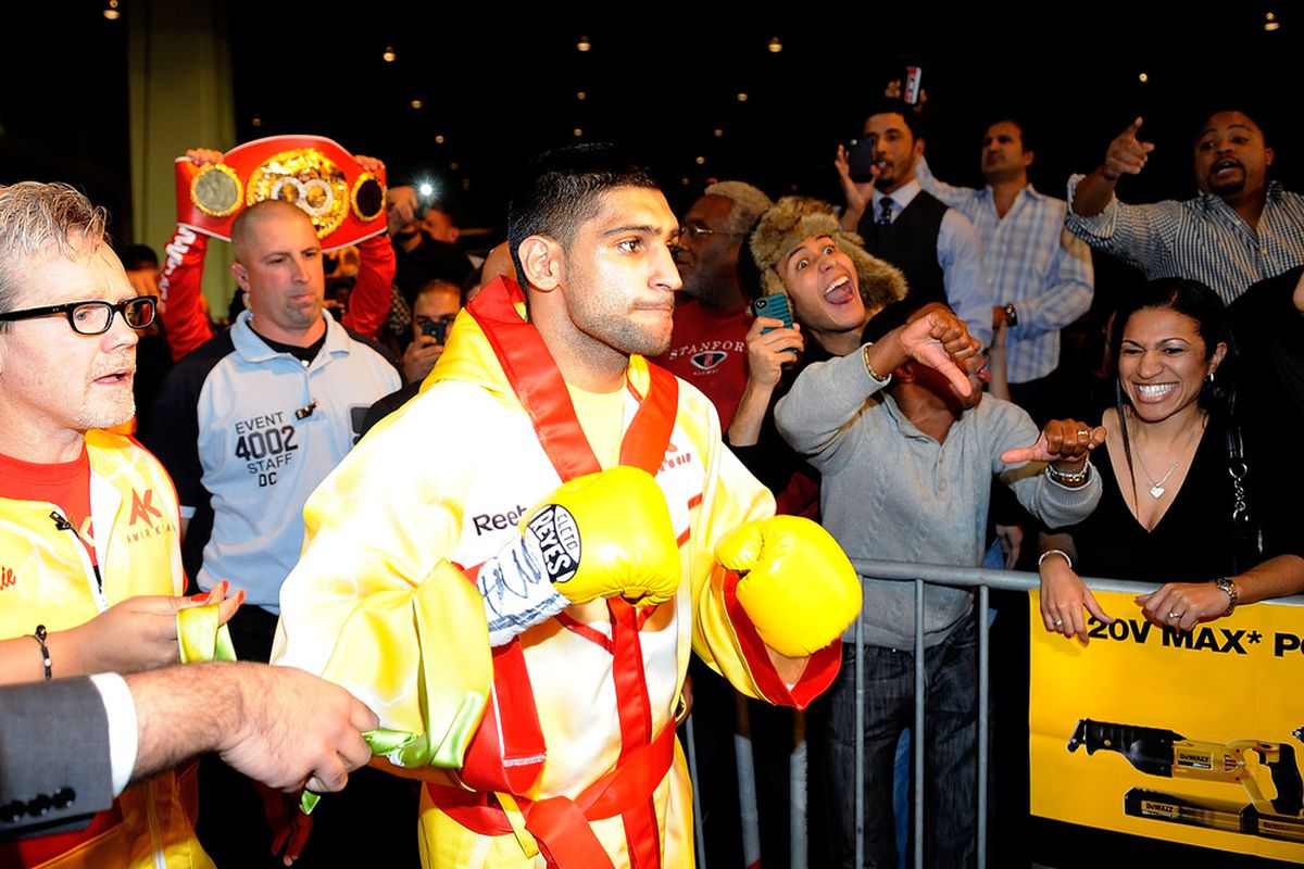 Amir Khan will make his return in July. (Photo by Patrick McDermott/Getty Images)