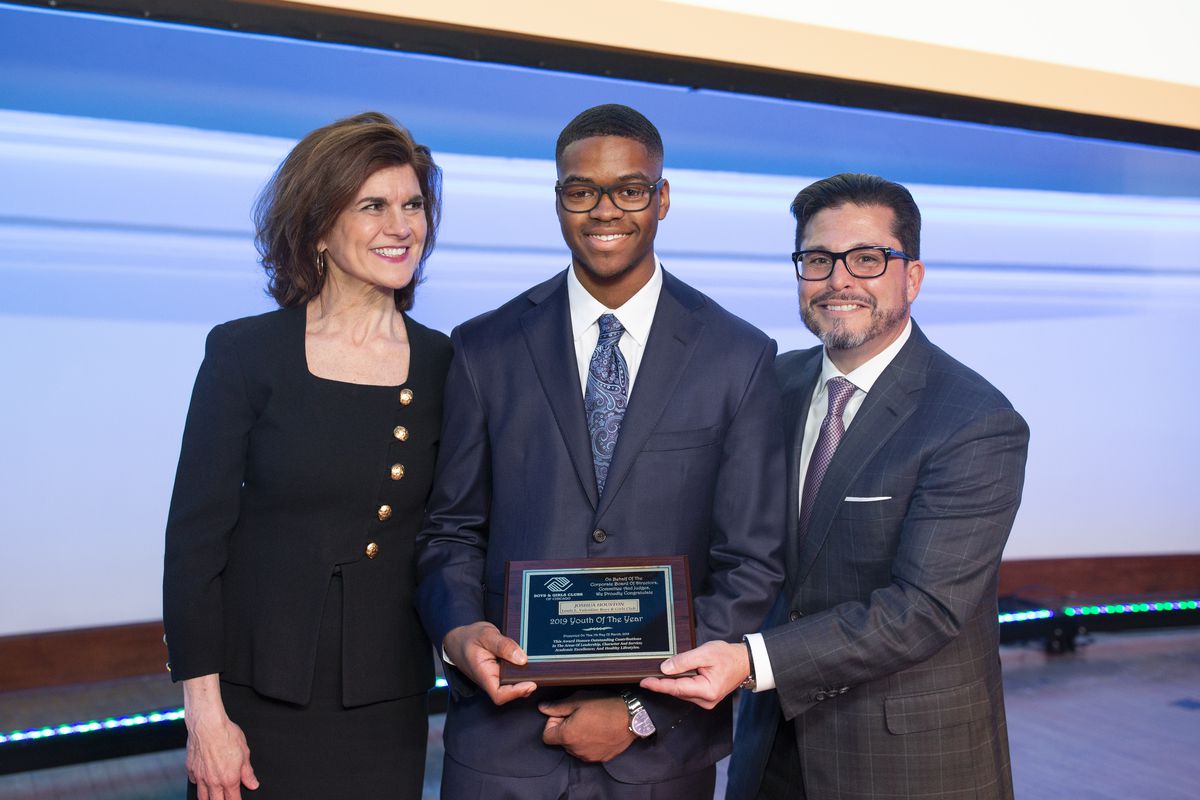 Boys &amp; Girls Club of Chicago President Mimi LeClair, Youth of the Year Joshua Houston and Board Chair Bartlett J. McCartin III at the group’s March 7 Youth of the Year Gala at Navy Pier. Houston, 18, of Beverly, won the 117-year-old organization’s hig
