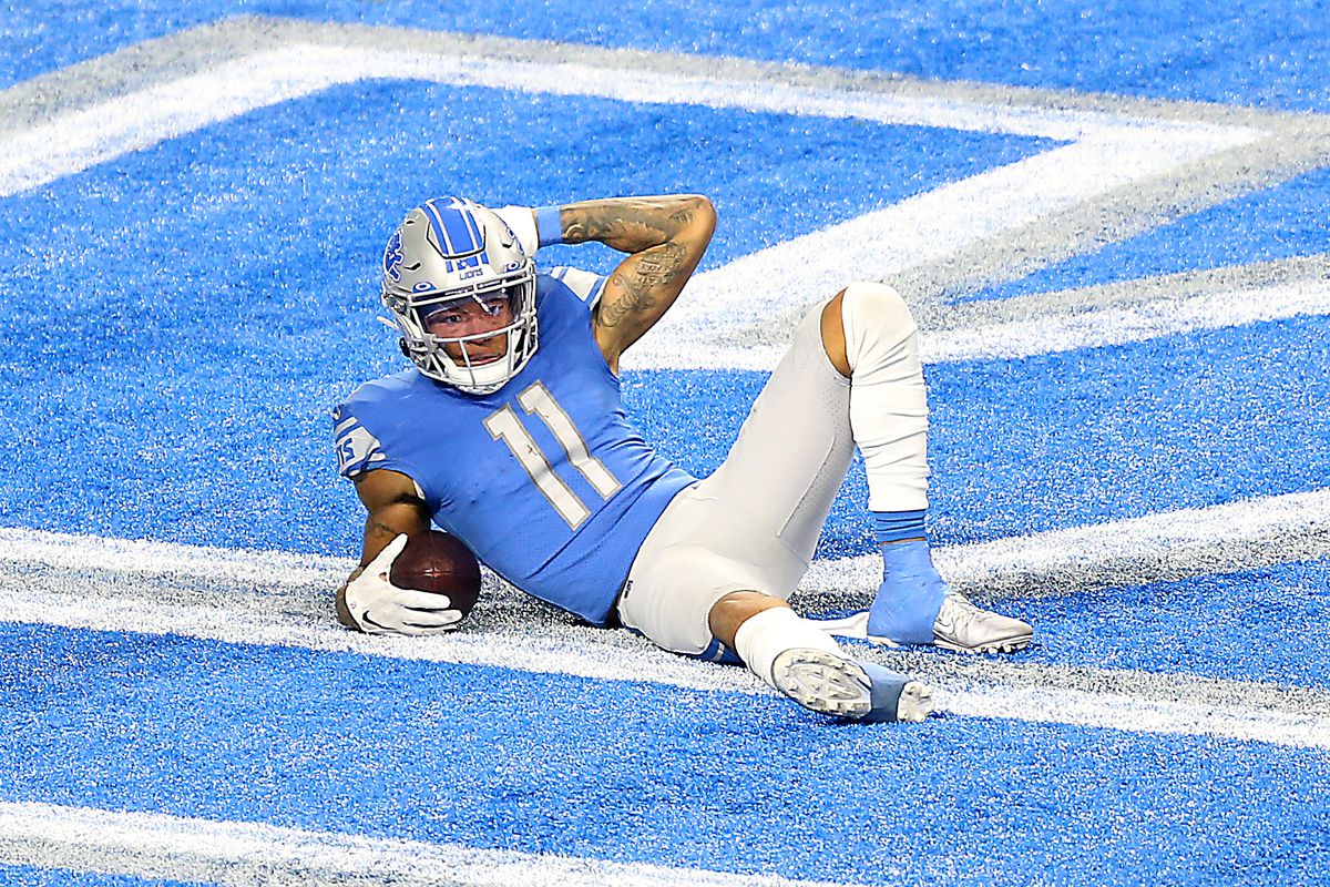 Detroit Lions wide receiver Marvin Jones (11) poses after bringing the ball into the end zone during the second half of an NFL football game between the Detroit Lions and the Minnesota Vikings in Detroit, Michigan USA, on Sunday, January 3, 2021.