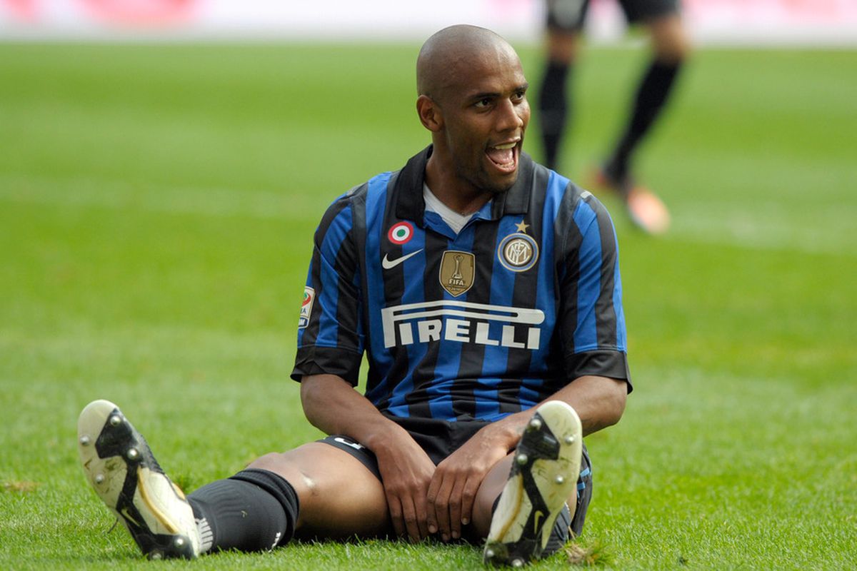 MILAN, ITALY - OCTOBER 23:  Maicon of FC Inter Milan reacts during the Serie A match between FC Internazionale Milano and AC Chievo Verona at Stadio Giuseppe Meazza on October 23, 2011 in Milan, Italy.  (Photo by Claudio Villa/Getty Images)