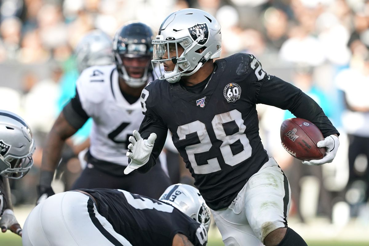 Oakland Raiders running back Josh Jacobs carries the ball during the fourth quarter against the Jacksonville Jaguars at Oakland Coliseum.