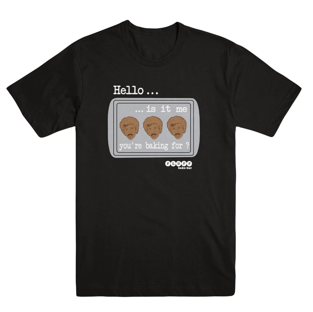A black t-shirt emblazoned with a silver cookie sheet and three cookies shaped like Lionel Richie’s head. The text reads “Hello...is it me you’re baking for?” 