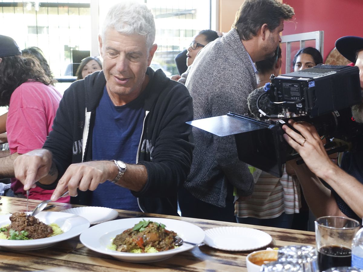 Anthony Bourdain filming 'Parts Unknown' at Juhu Beach Club in Oakland, California.