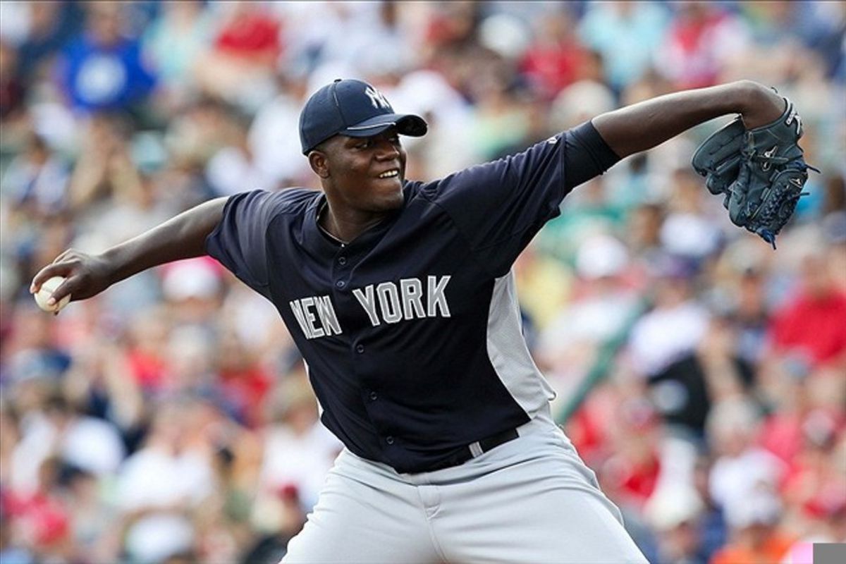 March 10, 2012; Lake Buena Vista FL, USA; New York Yankees starting pitcher Michael Pineda (35) pitches in the first inning of the game against the Atlanta Braves at Champion Stadium. Mandatory Credit: Daniel Shirey-US PRESSWIRE