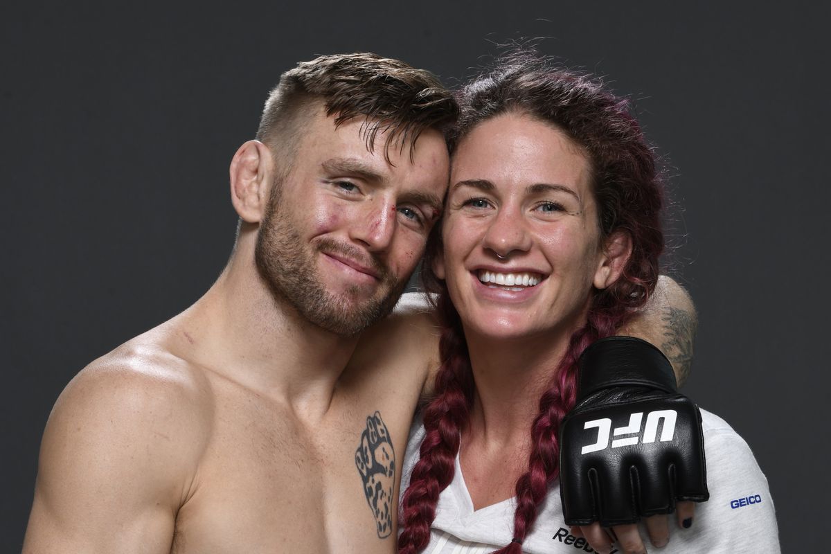 Tim Elliott poses for a portrait with girlfriend Gina Mazany after his victory during the UFC Fight Night event inside Flash Forum on UFC Fight Island on July 16, 2020 in Yas Island, Abu Dhabi, United Arab Emirates.
