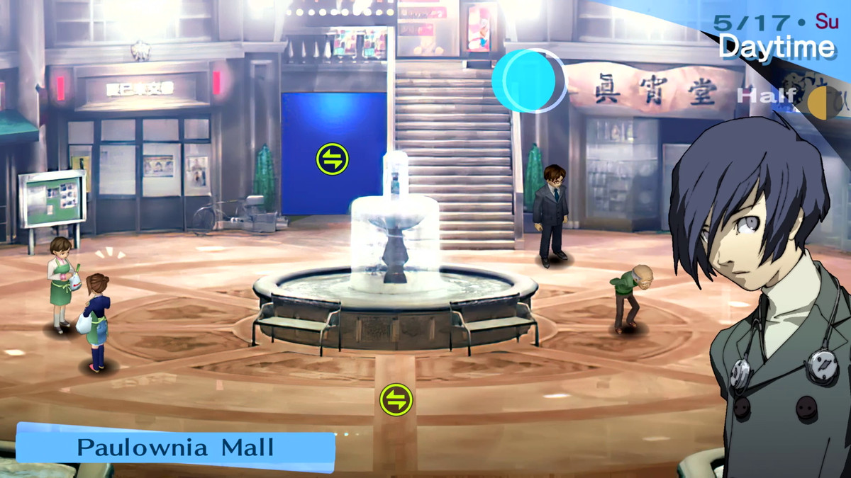 The protagonist’s dialogue box comes up over a cityscape at Paulownia Mall in Persona 3 Portable