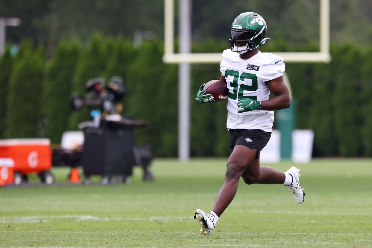 Michael Carter #32 of the New York Jets works out during a morning practice at Atlantic Health Jets Training Center on July 29, 2021 in Florham Park, New Jersey.