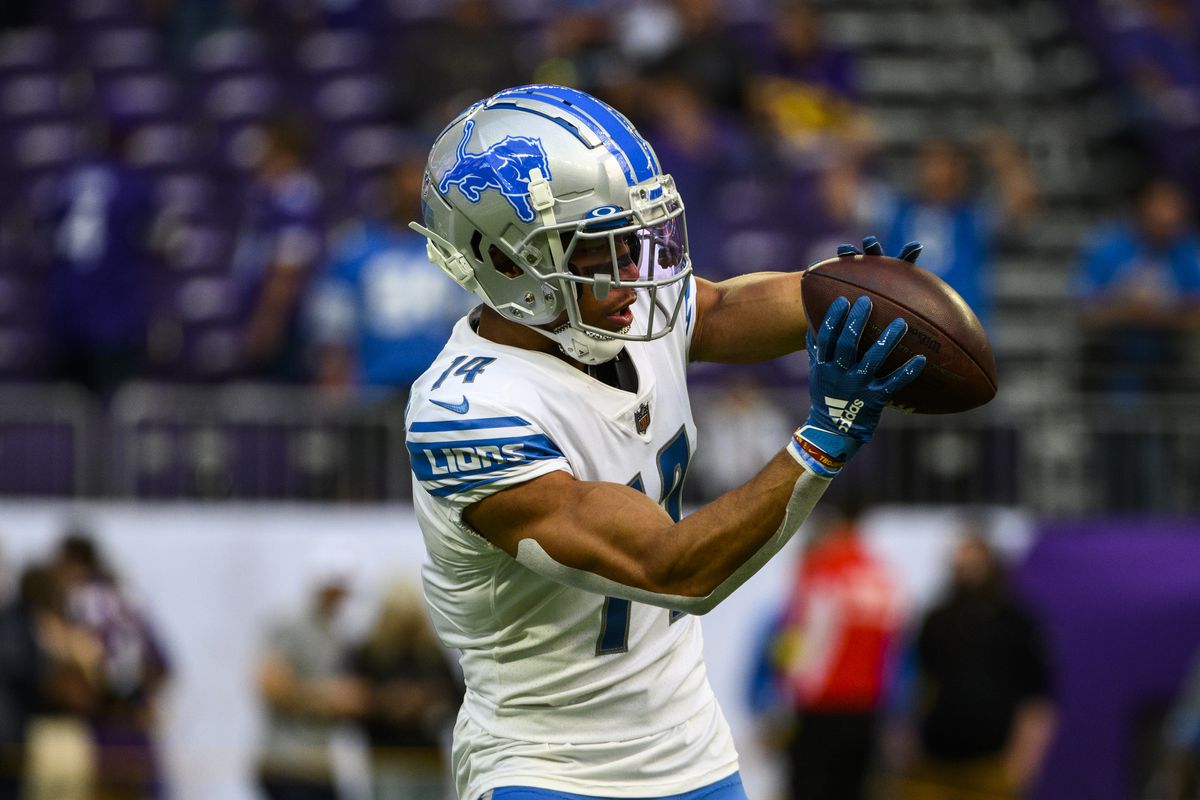 Amon-Ra St. Brown #14 of the Detroit Lions warms up before the game against the Minnesota Vikings at U.S. Bank Stadium on September 25, 2022 in Minneapolis, Minnesota.