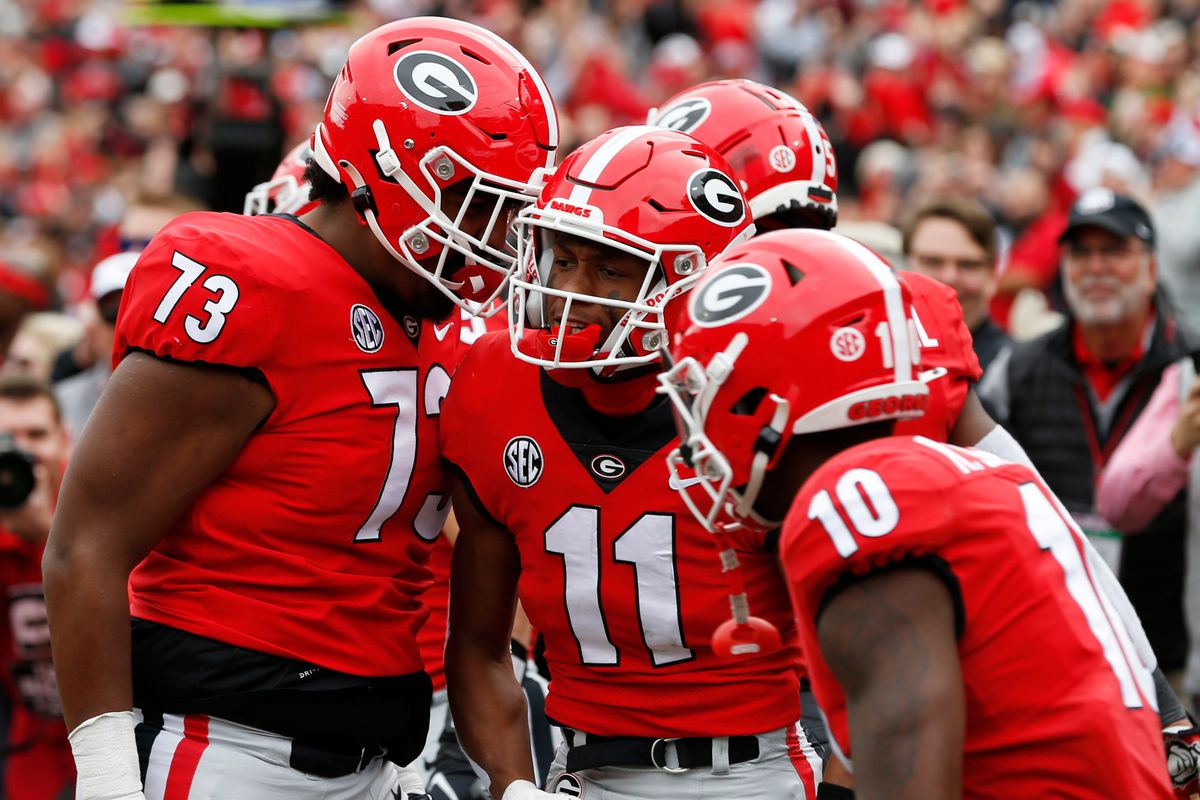 Georgia wide receiver Arian Smith celebrates with his teammates after scoring a touchdown during Georgia’s 43-6 home win over Missouri on Saturday, Nov. 6, 2021.&nbsp;