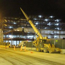6:41 p.m. The plaza building, with water main replacement equipment on Clark Street -