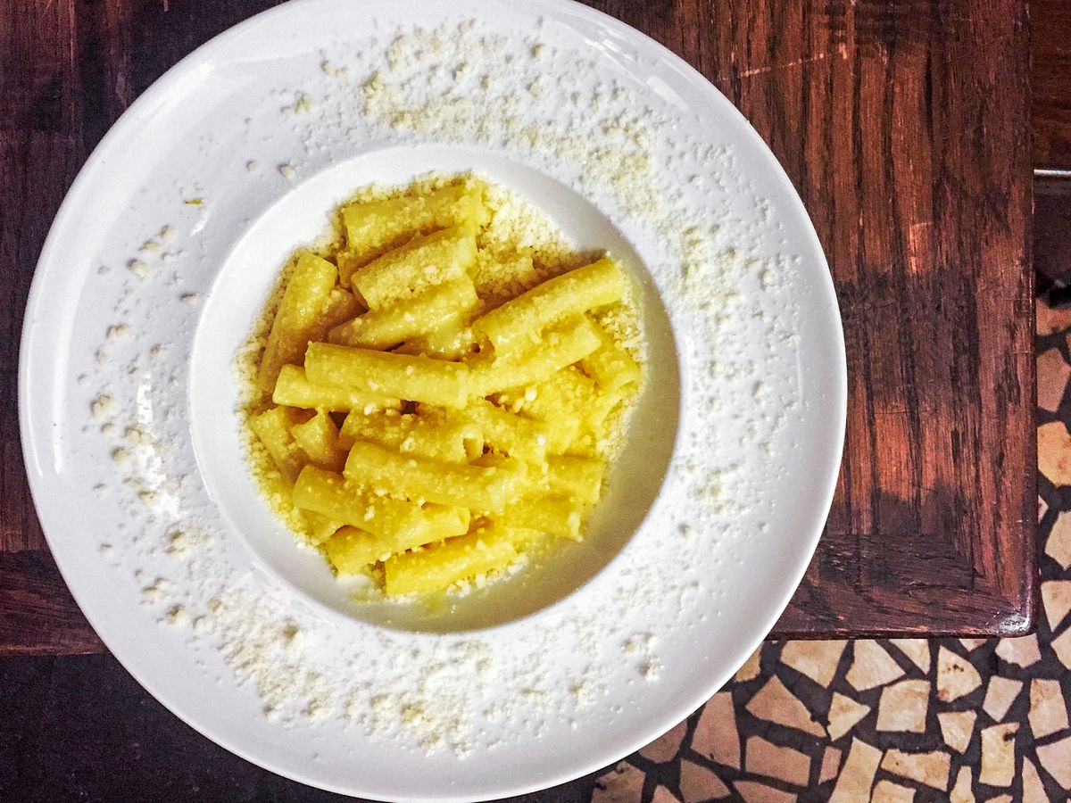 A plate of pasta on a white plate. 