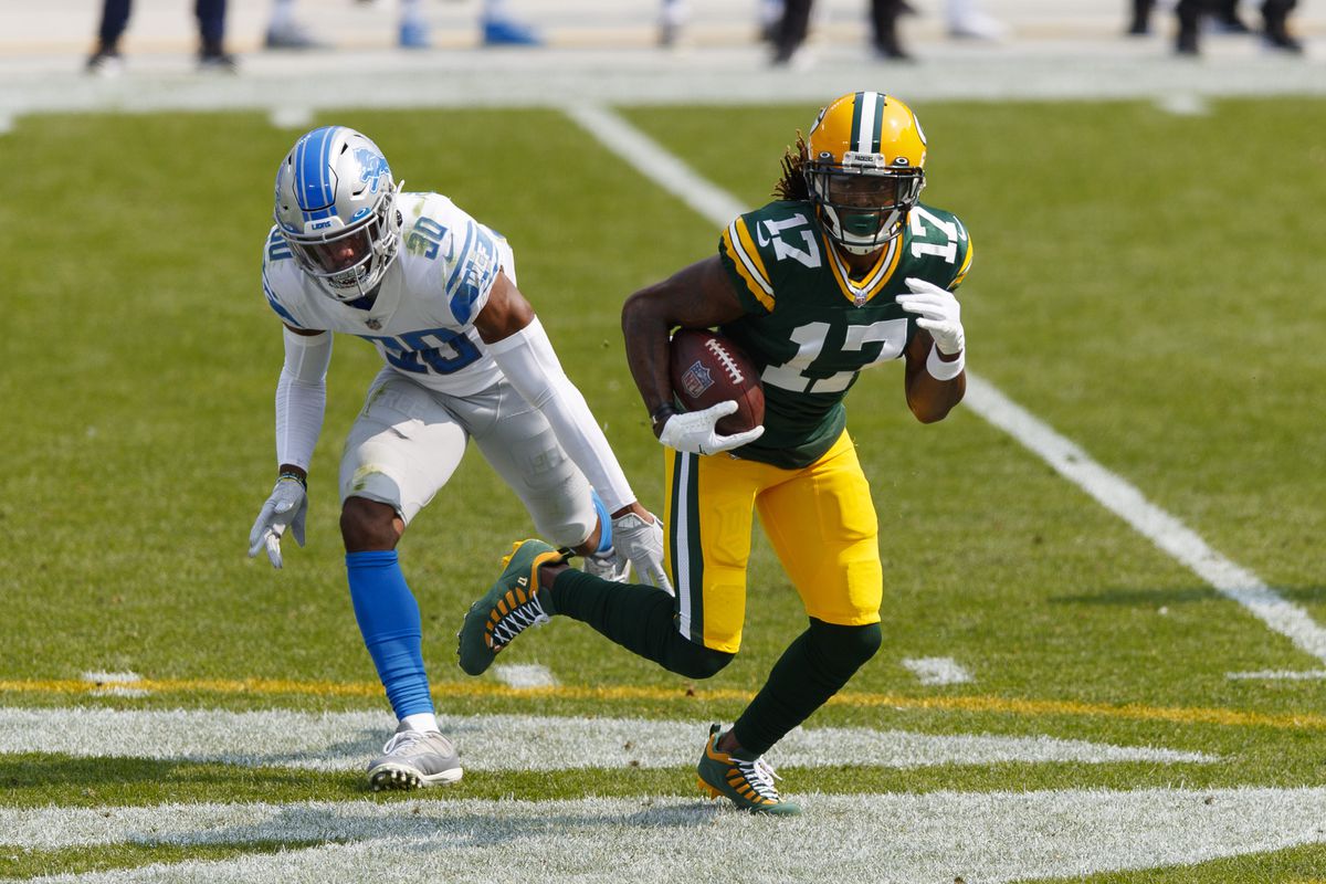 Green Bay Packers wide receiver Davante Adams rushes with the football after catching a pass during the second quarter against the Detroit Lions at Lambeau Field.