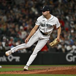 Matt Brash #47 of the Seattle Mariners follows through on his pitch during the seventh inning against the St. Louis Cardinals at T-Mobile Park on April 22, 2023 in Seattle, Washington.