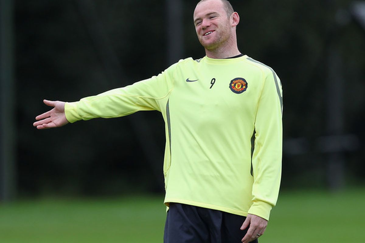 Wayne Rooney reconciles with Sir Alex Ferguson, who has recently acquired the power to turn invisible at will.