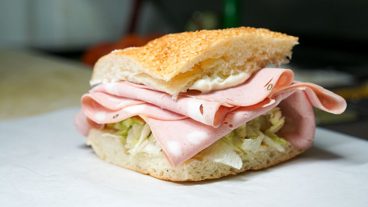A mortadella sandwich from Berge’s on sandwich paper