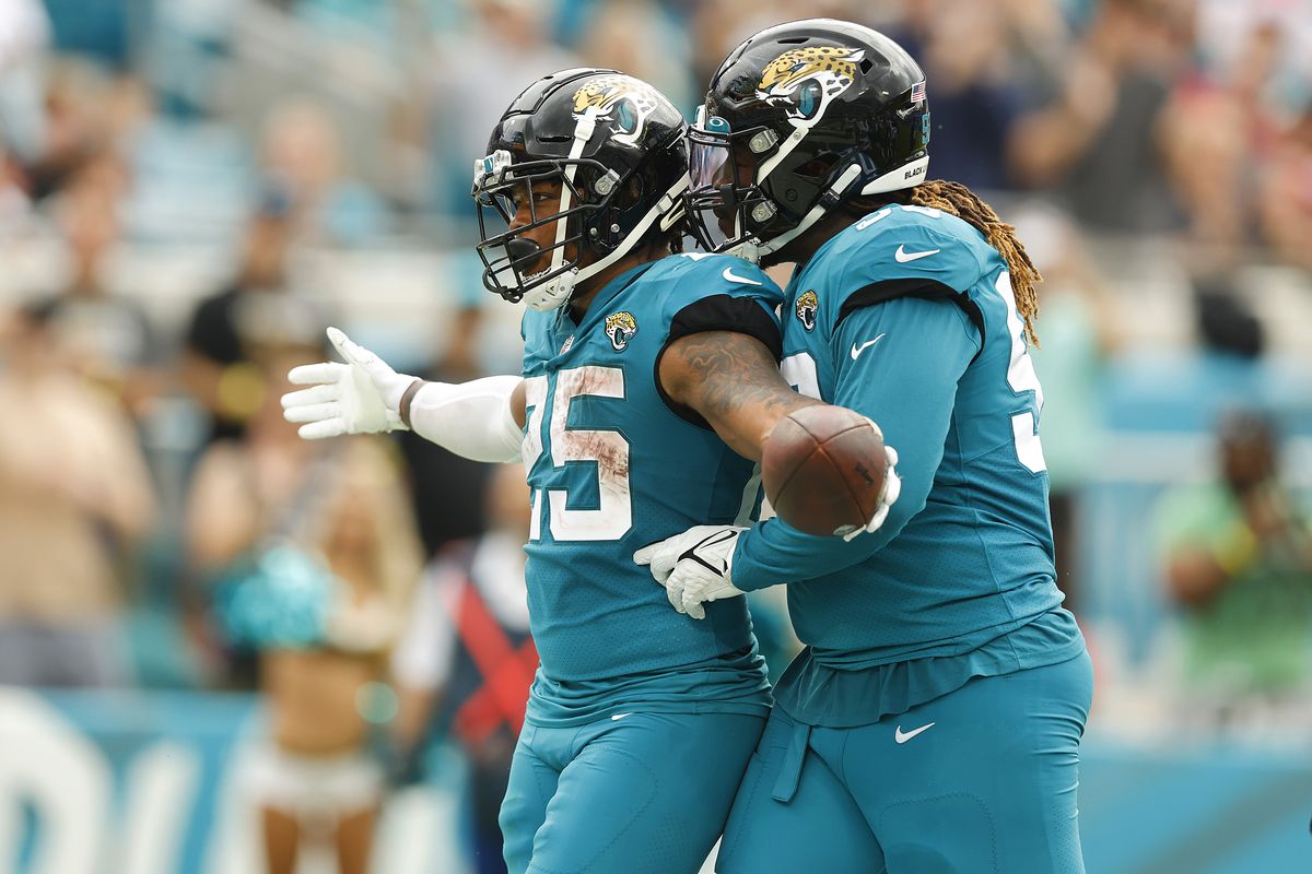 James Robinson #25 of the Jacksonville Jaguars celebrates after running for a touchdown during the first quarter against the Houston Texans at TIAA Bank Field on December 19, 2021 in Jacksonville, Florida.