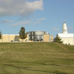 A view of the Joseph Smith Academy building in front of the Nauvoo Temple in 2003.