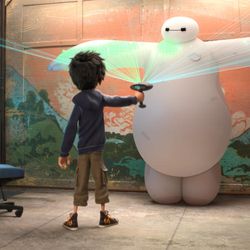 This image released by Disney shows animated characters Hiro Hamada, voiced by Ryan Potter, left, and Baymax, voiced by Scott Adsit, in a scene from "Big Hero 6." 