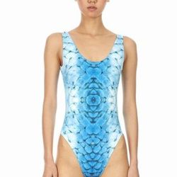 Been by D'Heygere mermaid scale bathing suit, <a href="http://www.openingceremony.us/products.asp?menuid=2&catid=33&designerid=1820&productid=99758">$51</a> (down from $170) at Opening Ceremony