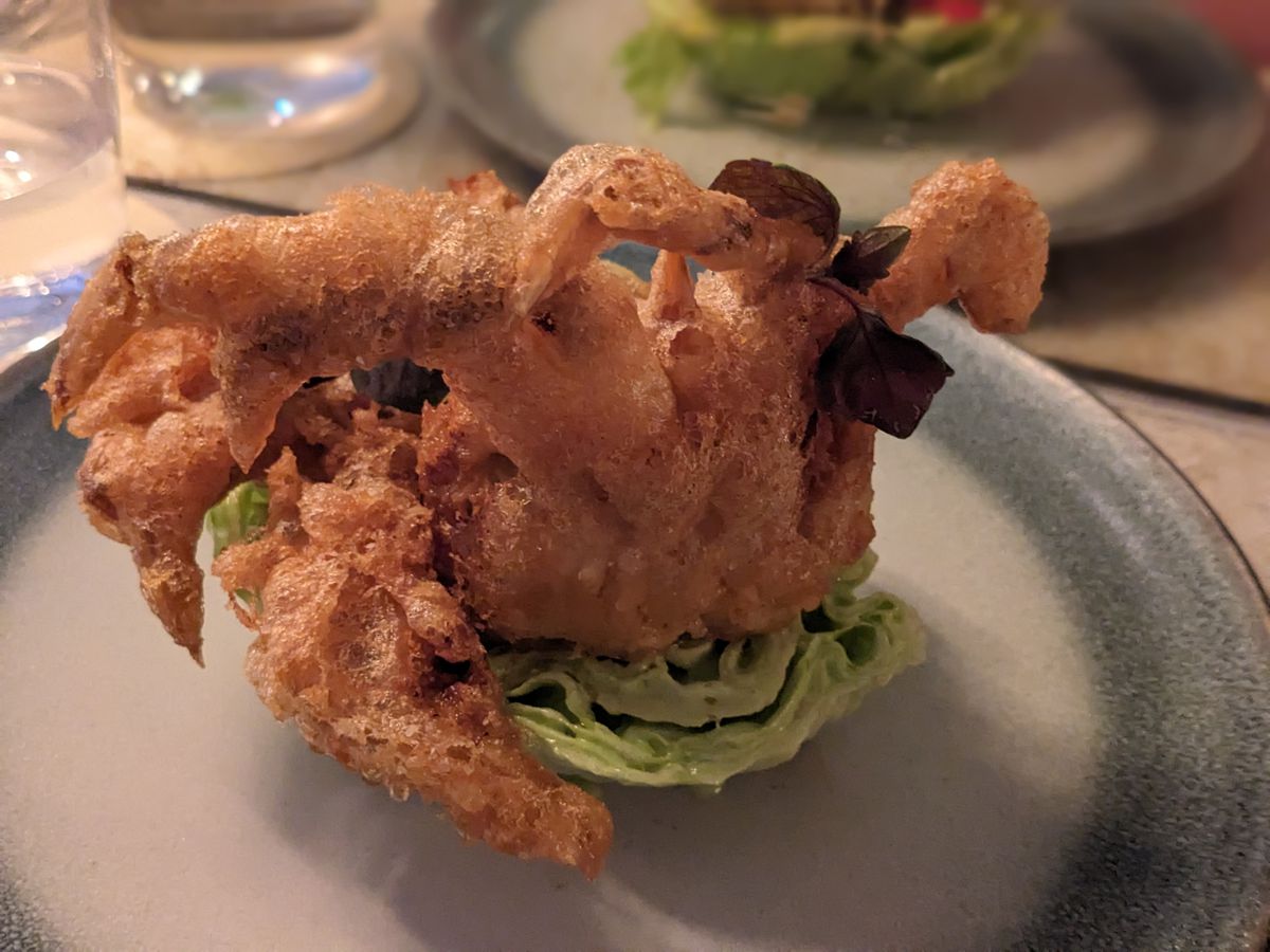 Fried soft-shell crab on lettuce. 