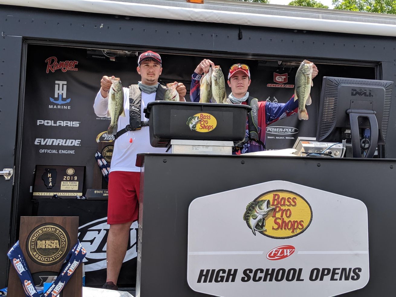 West Aurora juniors Tyler Harvey (left) and Fisher Overlin weigh their final day limit at the IHSA state finals for bass fishing to finish third. 
