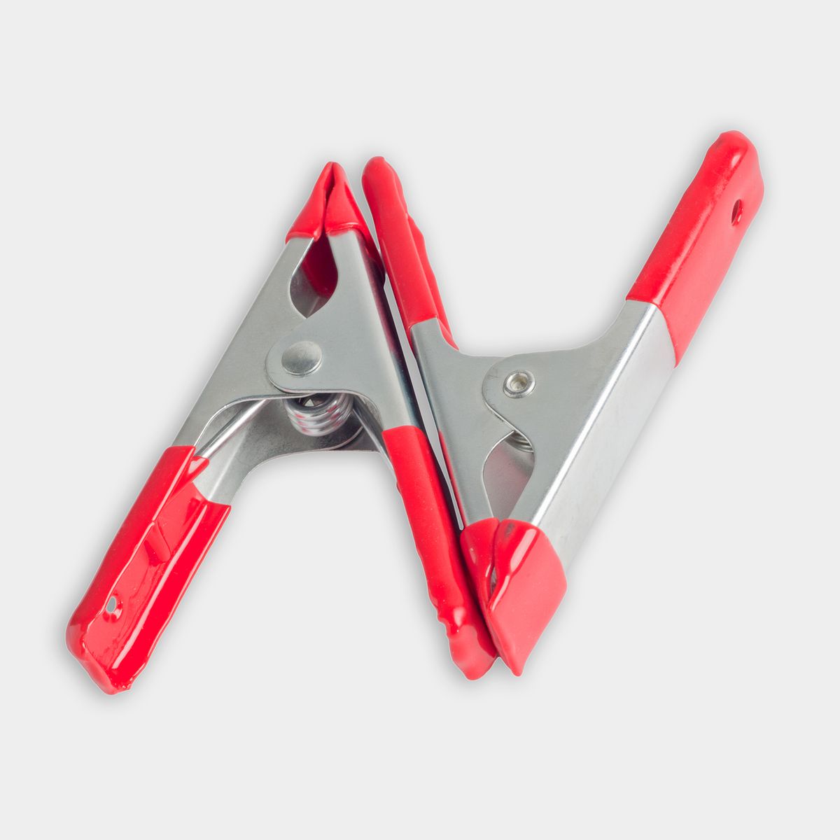 spring clamps on grey background