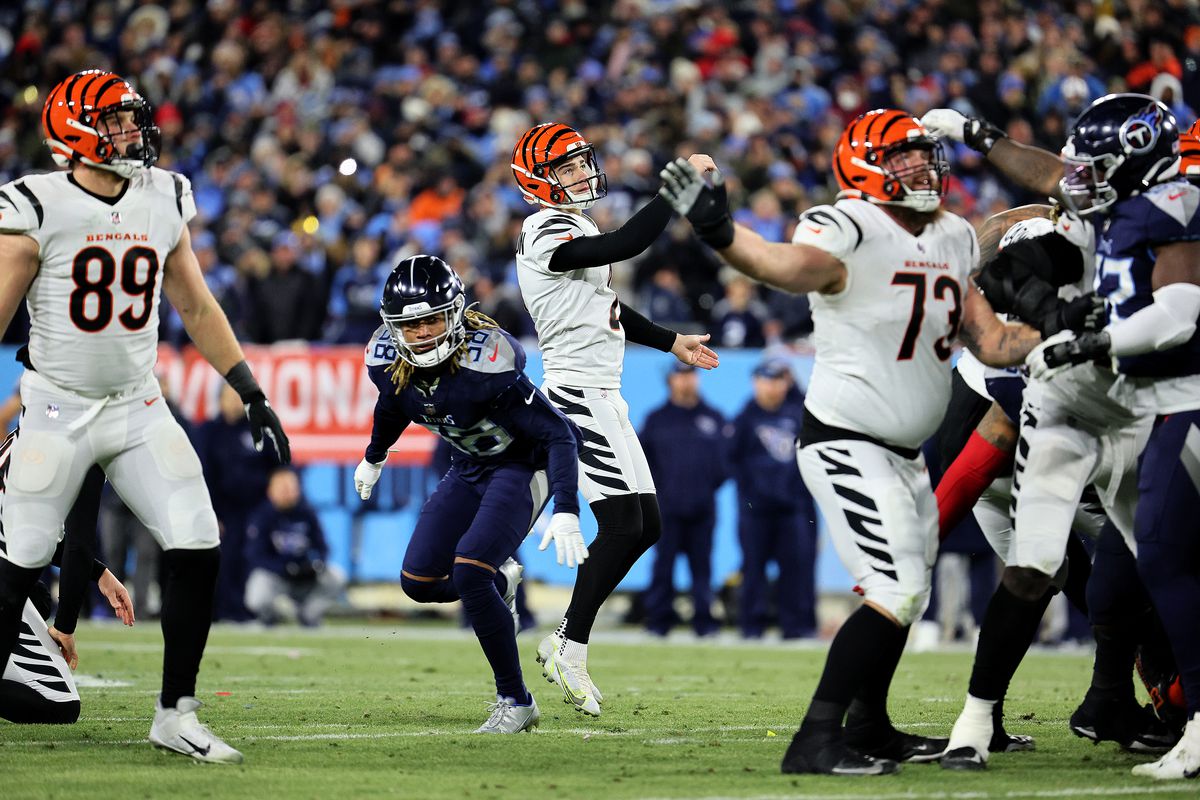 Kicker Evan McPherson #2 of the Cincinnati Bengals follows his game winning kick giving the Bengals a 19-16 win over the Tennessee Titans in the AFC Divisional Playoff game at Nissan Stadium on January 22, 2022 in Nashville, Tennessee.