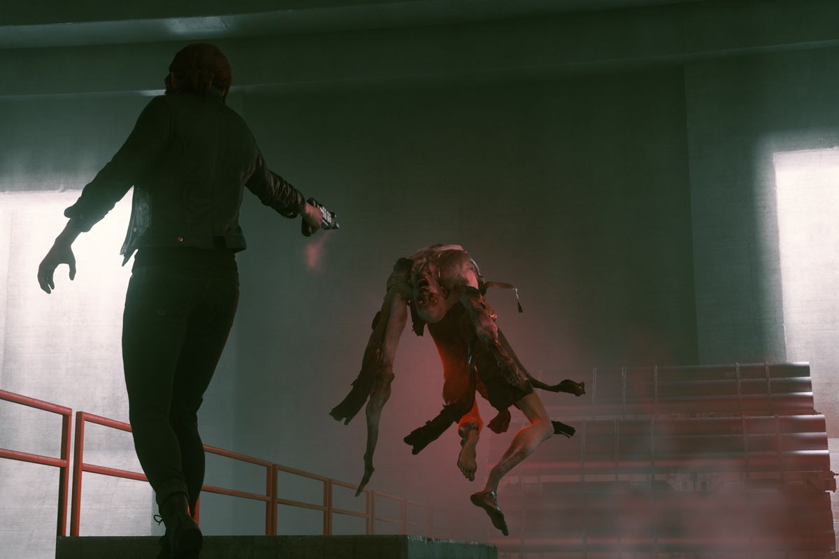 Control’s protagonist, Jesse, aims her gun at a grotesque, floating enemy