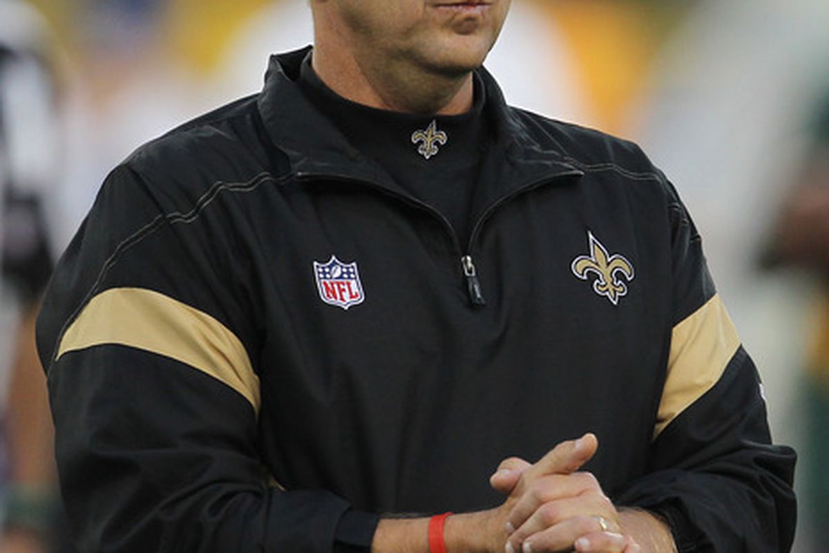 Sean Payton better keep his mouth shut just like this if he runs into Mickey Loomis in the next nine months.  (Photo by Jonathan Daniel/Getty Images)