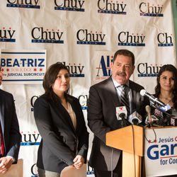 Cook County Commissioner and 4th Congressional District Candidate Jesus Chuy Garcia (at lectern) introduces a slate of three progressive Latino candidates (from left) Aaron Ortiz, Beatriz Frausto-Sandoval, and Alma Anaya at a press conference Thursday. | Max Herman/For the Sun-Times