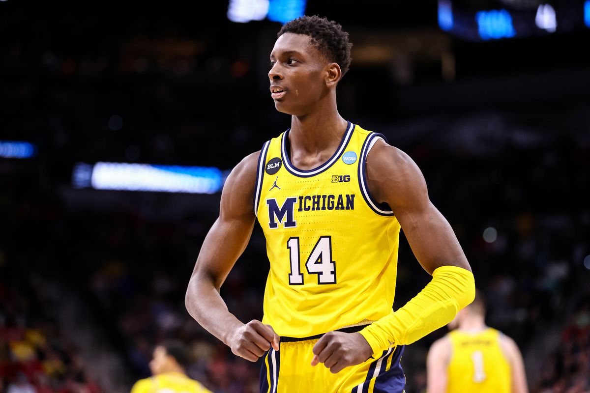 Moussa Diabate #14 of the Michigan Wolverines flexes in celebration during the Sweet 16 round of the 2022 NCAA Mens Basketball Tournament held at AT&amp;T Center on March 24, 2022 in San Antonio, Texas.