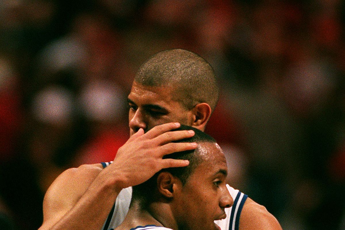 Minnneapolis Mn, Duke vs Maryland 3/31/01photo by Jerry Holt-----Duke players Jason Williams 22, and Shane Battier give each other a hug after their win over Maryland in the semifinal of the Final Four in Minneapolis.