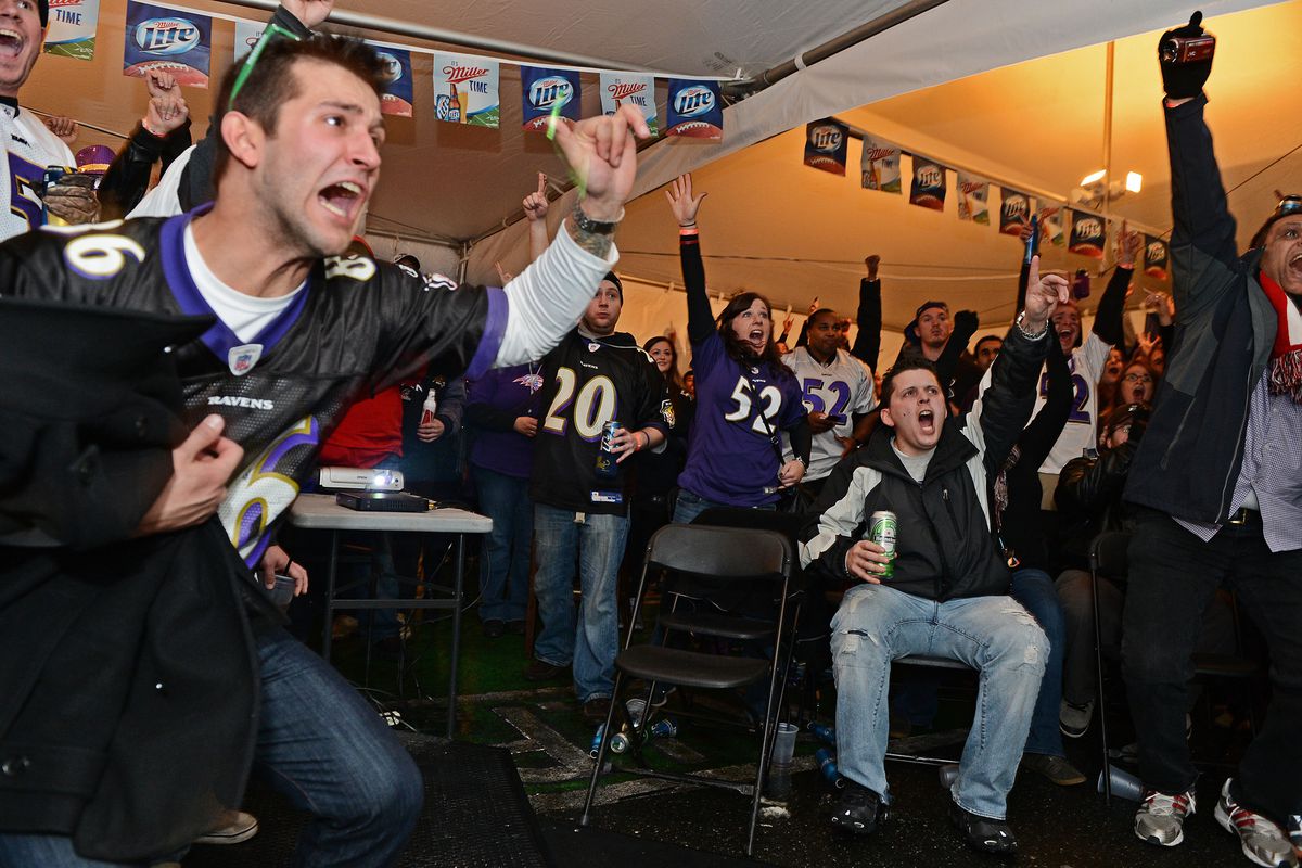 Ravens fans cheering on Super Bowl Sunday as the Ravens take on the 49ers.