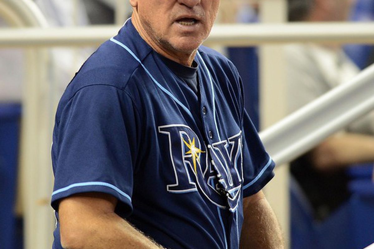 June 10, 2012; Miami, FL, USA; Tampa Bay Rays manager Joe Maddon (70) looks on from the dugout during the seventh inning against the Miami Marlins at Marlins Park. Tampa Bay Rays won 4-2. Mandatory Credit: Steve Mitchell-US PRESSWIRE