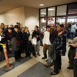 Couples wait to get marriage licenses outside the Salt Lake County clerk's office, Monday, Dec. 23, 2013. U.S. District Judge Robert Shelby denied a motion by the state of Utah to halt same-sex marriages pending an appeal.