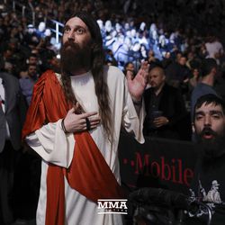 A fan gets ready for UFC 219 main event.