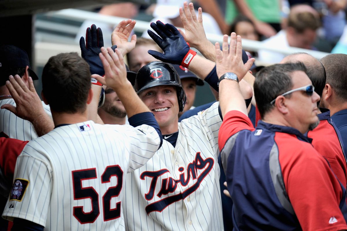 MINNEAPOLIS, MN - AUGUST 28: Luke Hughes #38 of the Minnesota Twins celebrates a two-run home run against the Detroit Tigers in the fourth inning on August 28, 2011 at Target Field in Minneapolis, Minnesota. (Photo by Hannah Foslien/Getty Images)