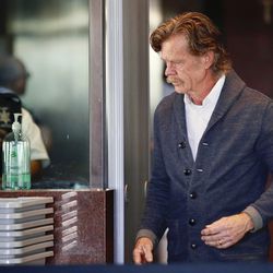 Actor William H. Macy arrives at the federal courthouse in Los Angeles, on Tuesday, March 12, 2019.  Fifty people, including Macy's wife, actress Felicity Huffman and actress Lori Loughlin, were charged Tuesday in a scheme in which wealthy parents allegedly bribed college coaches and other insiders to get their children into some of the nation's most elite schools. Macy was not charged; authorities did not say why. (AP Photo/Alex Gallardo)