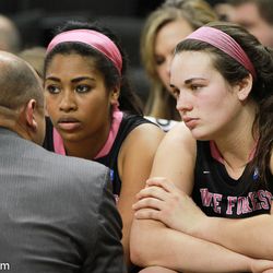 Lindsy and Mykala listen to Coach Terry