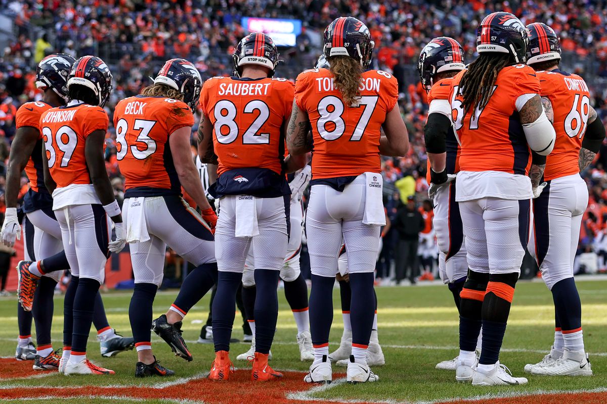 The Denver Broncos offense gets ready for a play during an NFL game between the Arizona Cardinals and the Denver Broncos on December 18, 2022 at Empower Field at Mile High in Denver, CO.