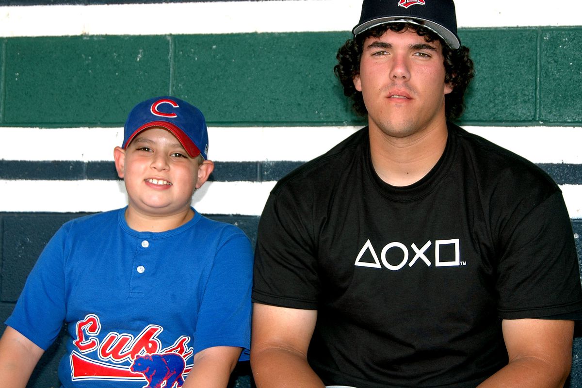 Little Leaguer Keith Scherffius and 2005 Twins draftee Henry Sanchez. Hope they're well.