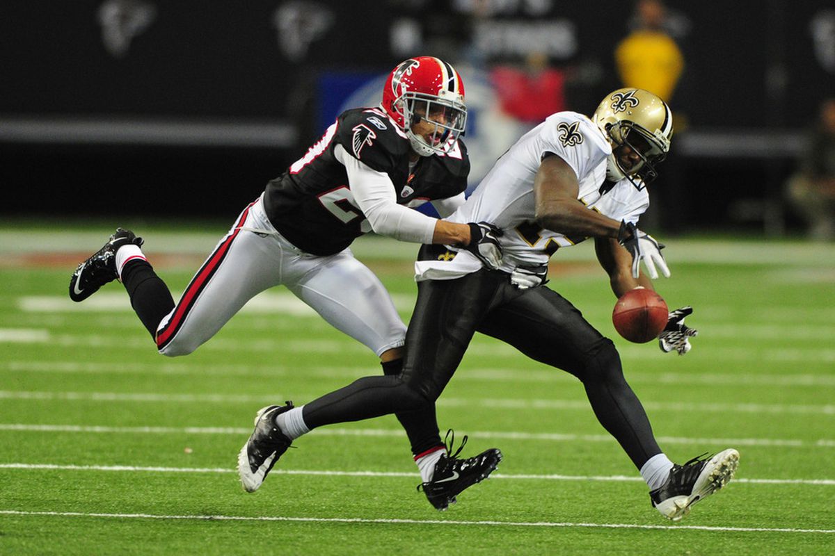 ATLANTA, GA - NOVEMBER 13: Devery Henderson #19 of the New Orleans Saints reaches for a pass against Brent Grimes #9 of the Atlanta Falcons at the Georgia Dome on November 13, 2011 in Atlanta, Georgia. (Photo by Scott Cunningham/Getty Images)