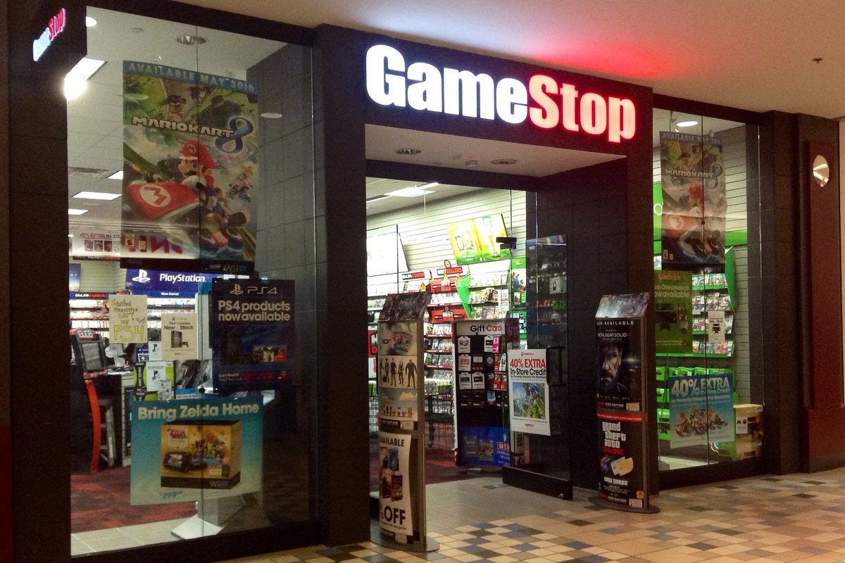 A GameStop storefront inside a shopping mall.